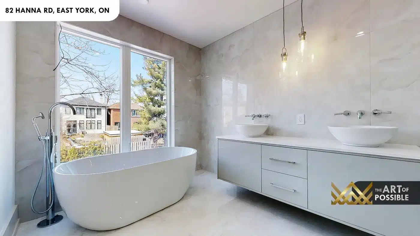 Primary ensuite with freestanding oval soaker tub and double vessel sinks at 82 Hanna Rd