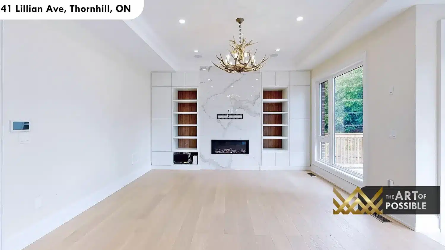 41 Lillian Ave Thornhill family room white marble fireplace surround built-in cabinetry walnut shelving