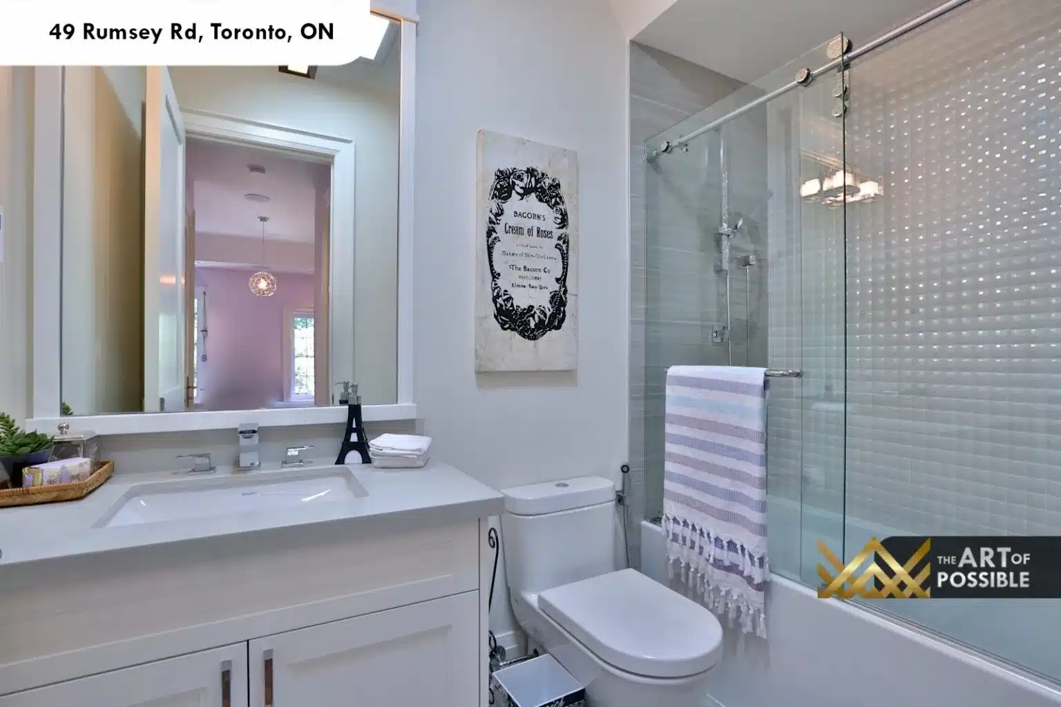 49 Rumsey Rd secondary bathroom white shaker vanity quartz countertop glass tub enclosure