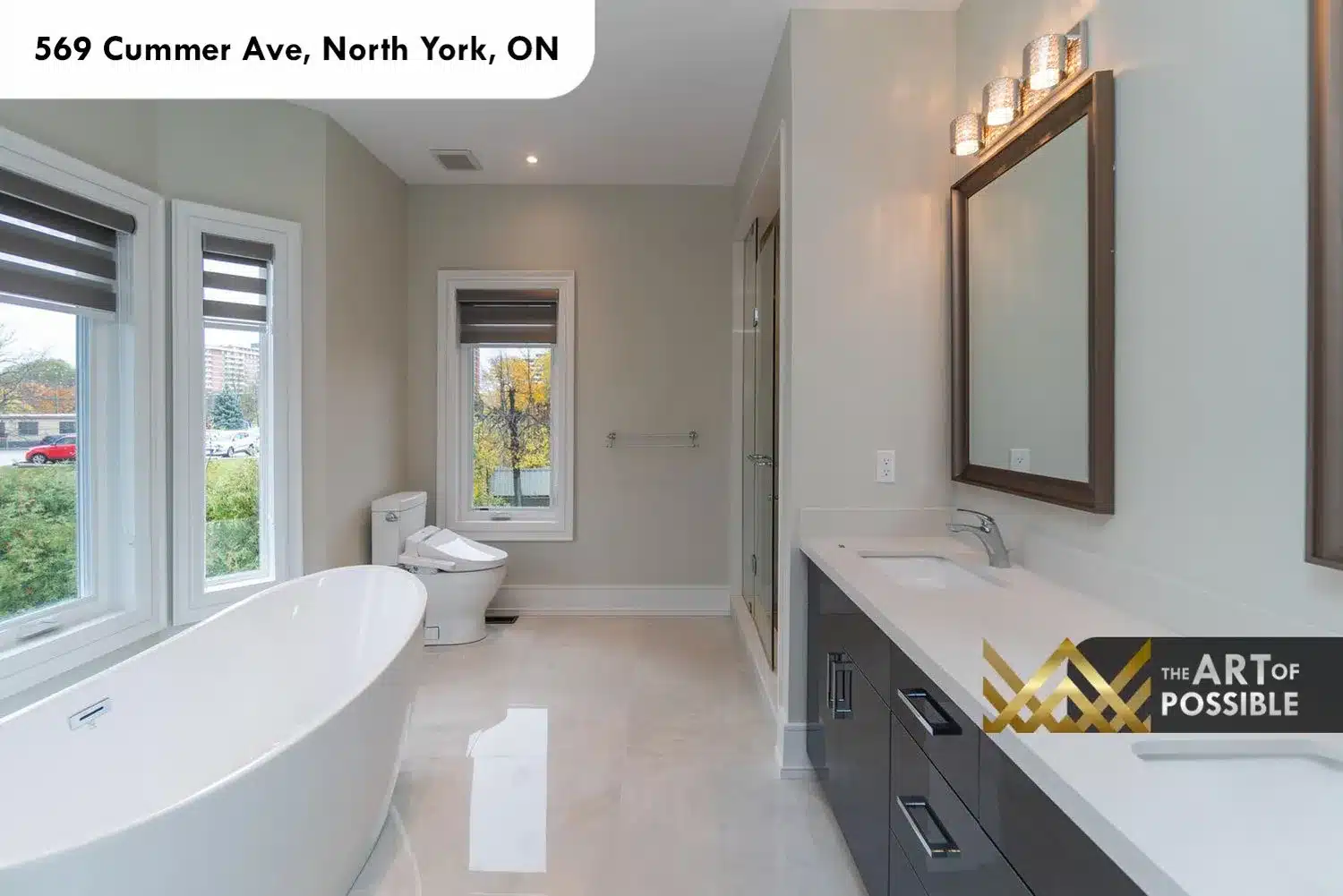 569 Cummer Ave primary ensuite soaker tub window view vanity sconce lighting