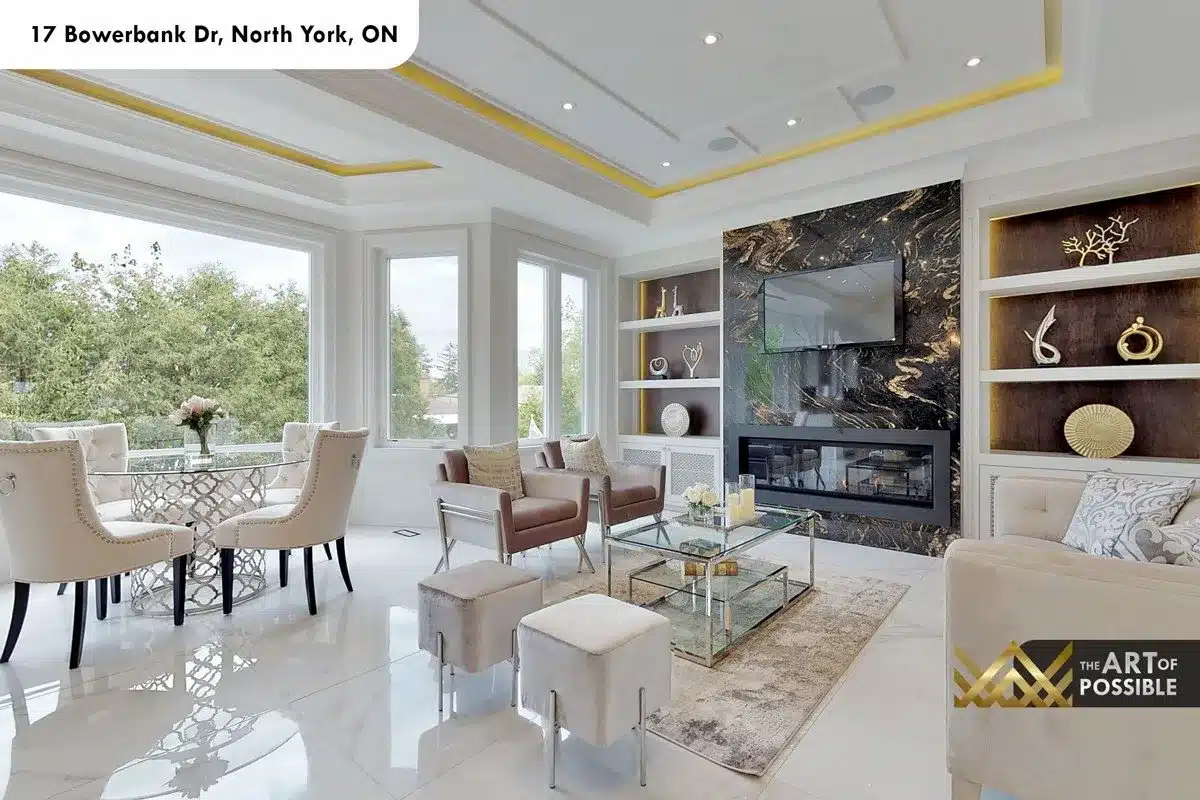 Family room and dining area with floor-to-ceiling windows and gold tray ceiling