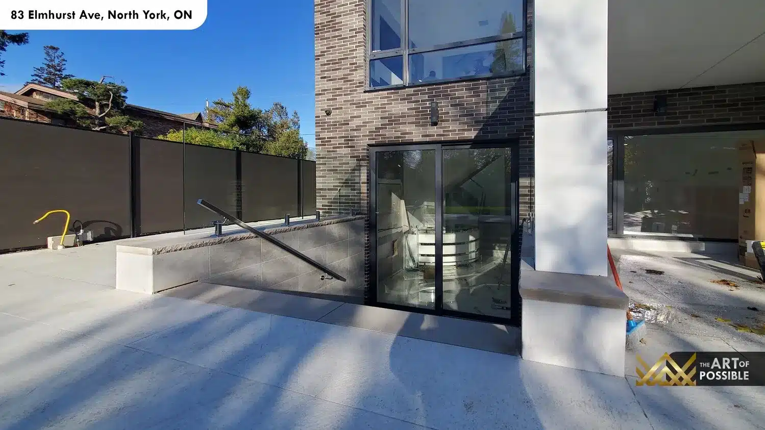 83 Elmhurst Ave North York lower level walkout glass doors patio brick exterior