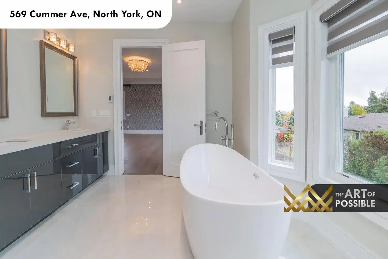 569 Cummer Ave primary ensuite freestanding soaker tub chrome faucet dual vanity dark grey cabinets