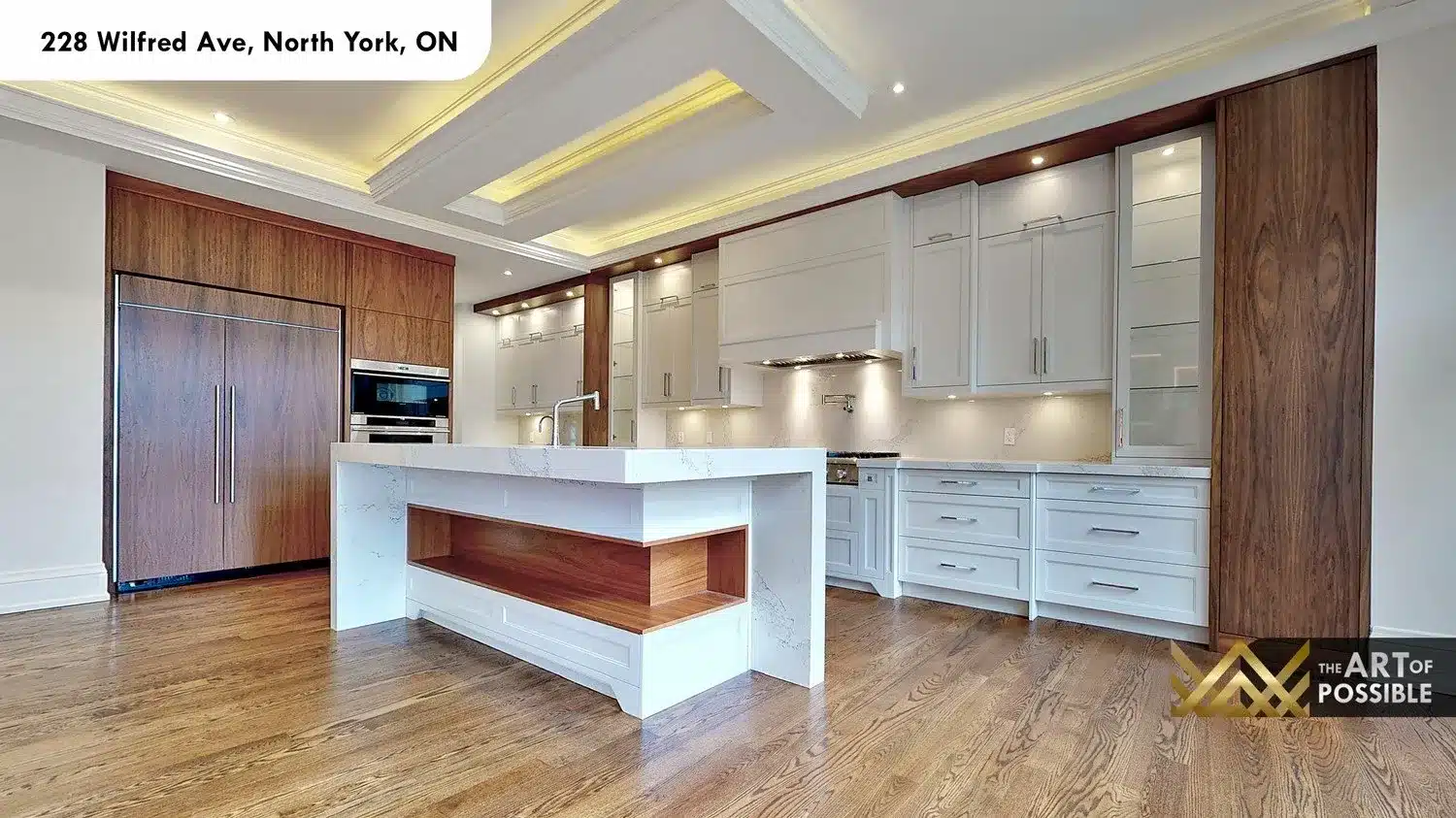 228 Wilfred Ave kitchen two-tone shaker cabinetry walnut accents waterfall island