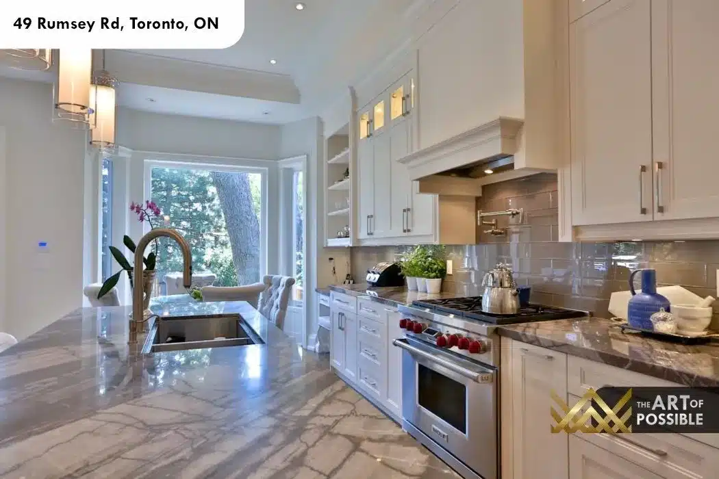 49 Rumsey Rd kitchen marble island countertop gas range pot filler professional appliances
