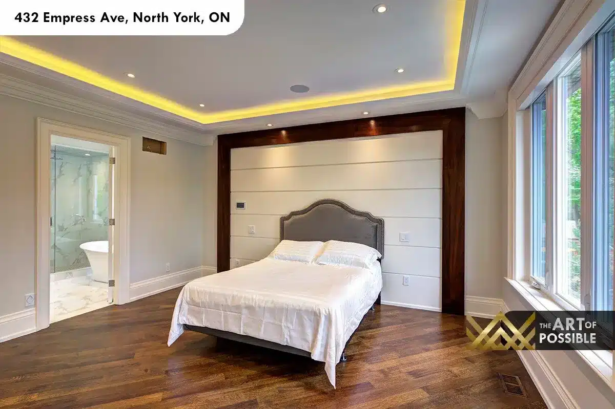 432 Empress Ave - primary bedroom with dark walnut headboard feature wall and LED alcoves
