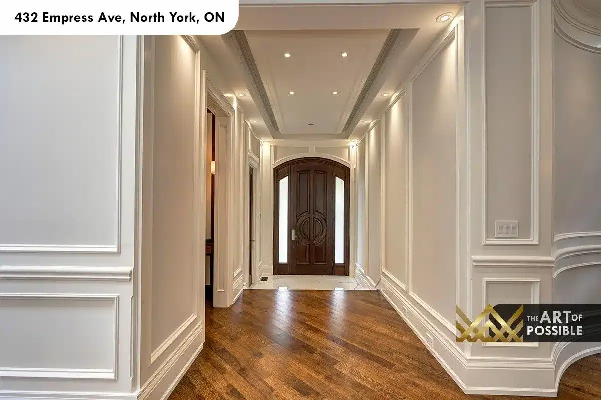 432 Empress Ave - foyer with tray ceiling, wainscoting and arched walnut entry door