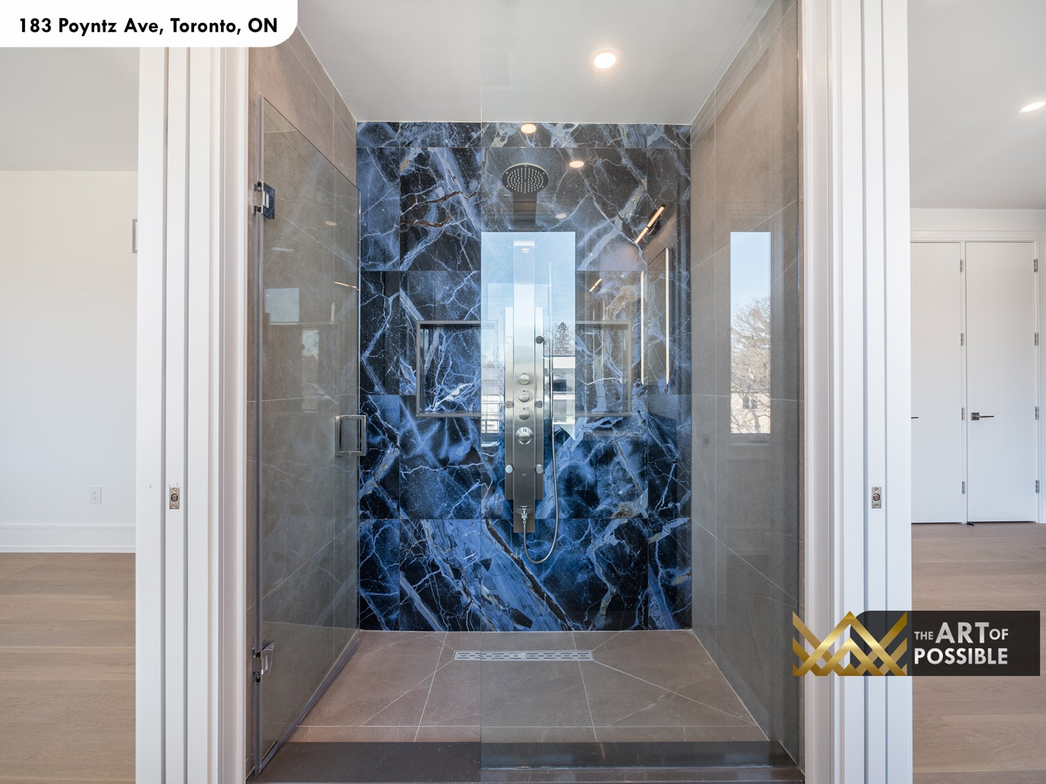 183 Poyntz Ave North York primary shower with full-height navy blue marble slab walls white veining and ceiling rain head