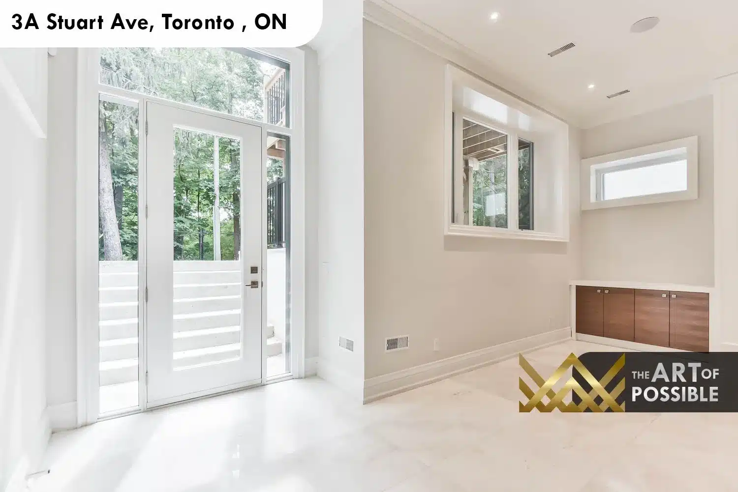 Walkout exterior door at lower level of 3A Stuart Ave with glass panel and rear access staircase