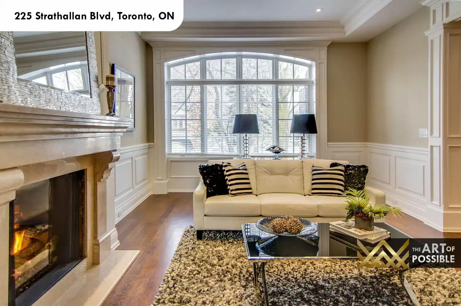 225 Strathallan Blvd Toronto - Living room with fireplace and wainscotting