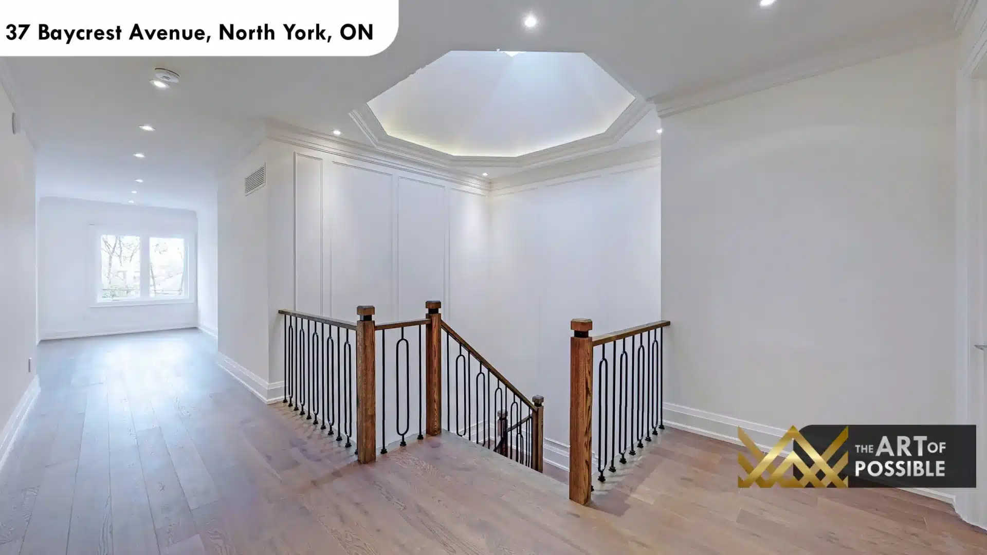 37 Baycrest Ave second floor landing octagonal skylight tray ceiling LED cove lighting black iron balusters