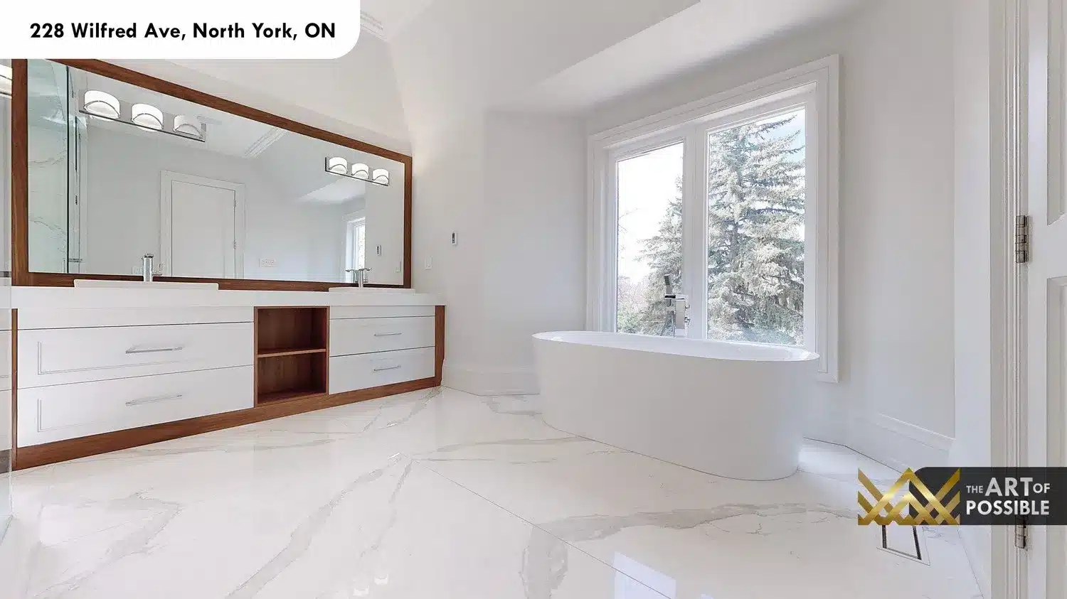 228 Wilfred Ave primary ensuite freestanding soaker tub marble floor double vanity walnut mirror
