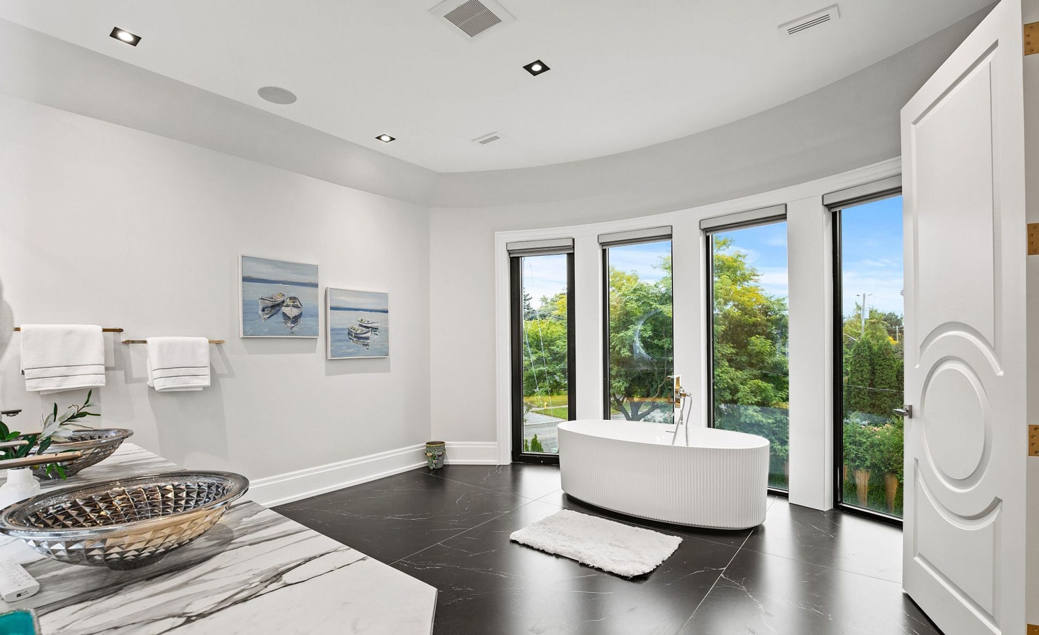Ensuite vanity and backlit mirror detail