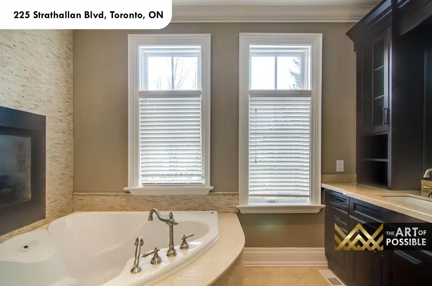 225 Strathallan Blvd Toronto - Primary ensuite soaker tub with stacked stone wall
