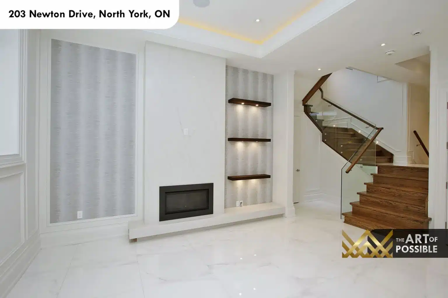 Lower level recreation room with linear fireplace and floating walnut shelves