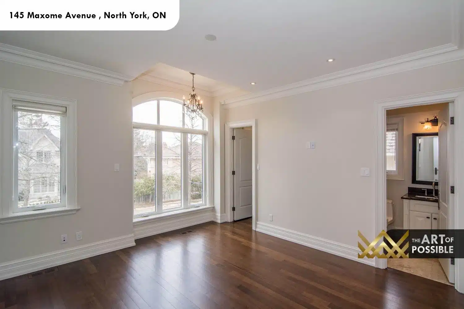 145 Maxome Avenue secondary bedroom arched palladian window dark hardwood ensuite