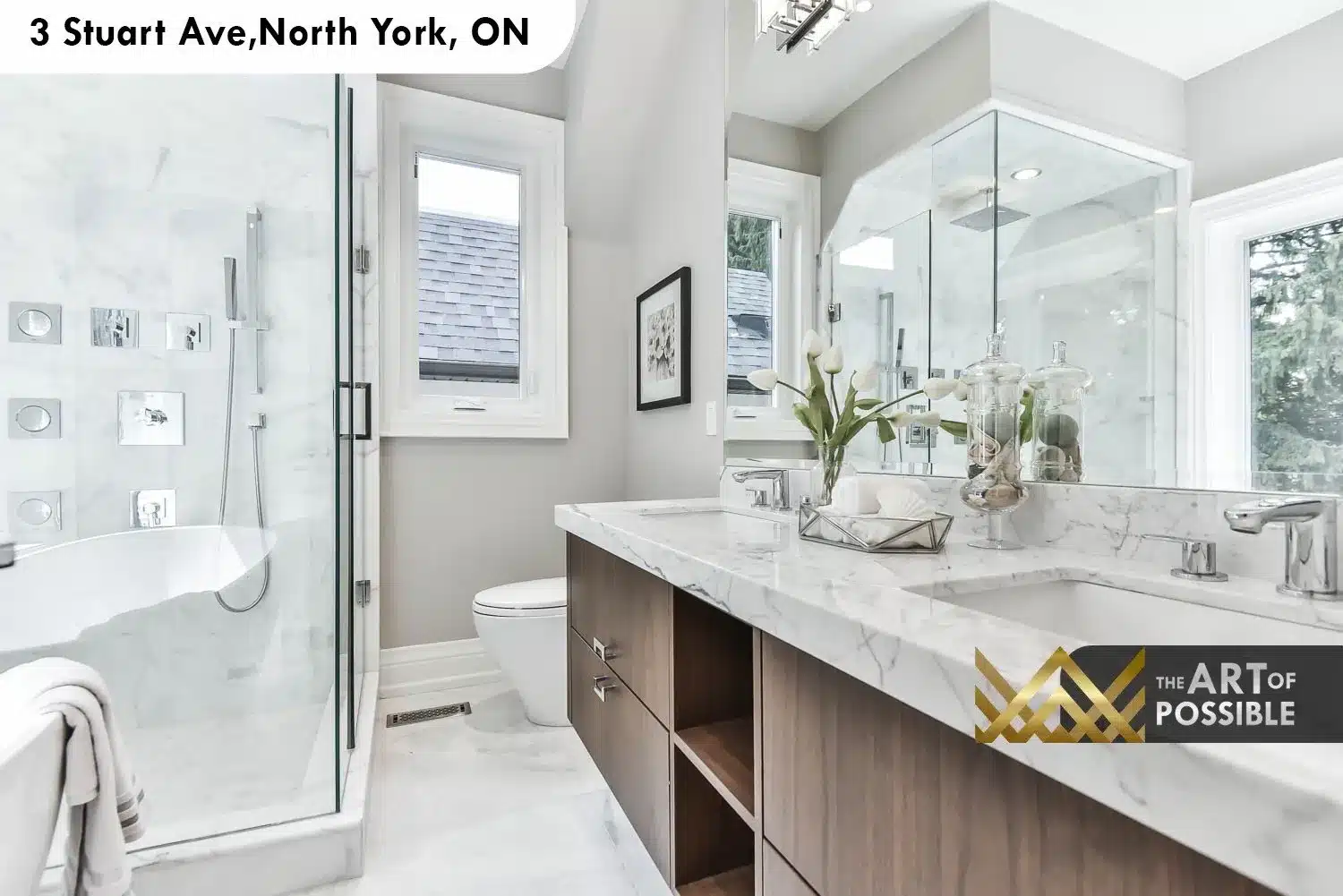 Primary ensuite with marble double vanity, walnut cabinet, frameless glass shower with body jets and freestanding soaker tub