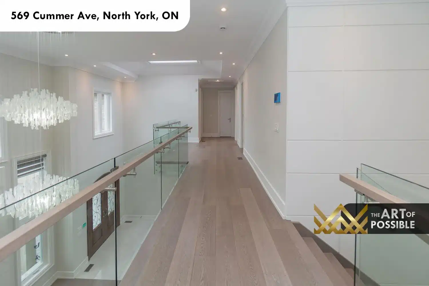 569 Cummer Ave upper landing glass gallery railing oak hardwood skylight corridor