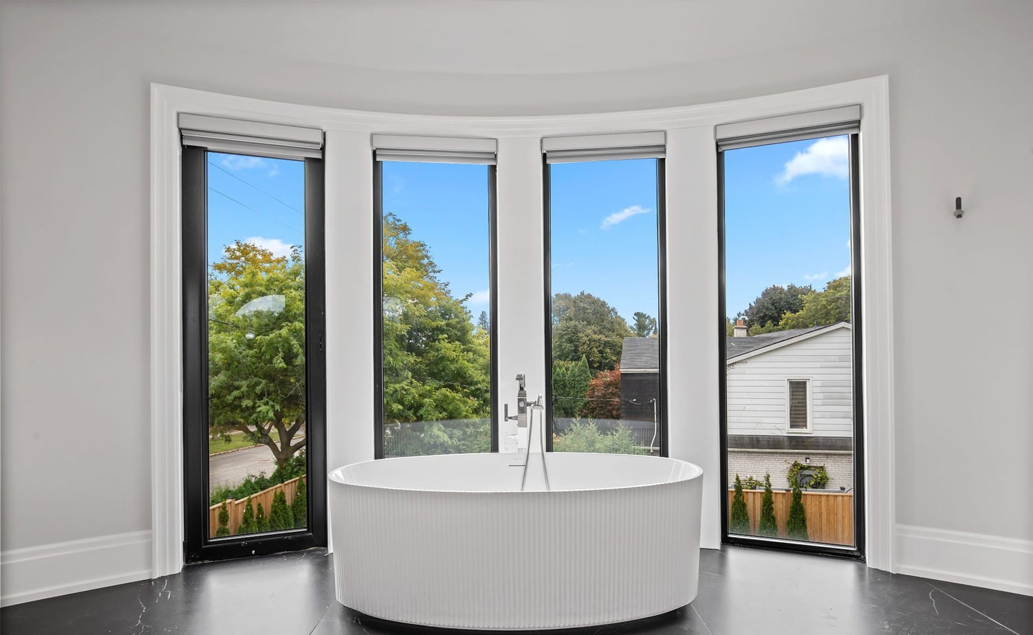 Secondary bedroom with ensuite and custom millwork