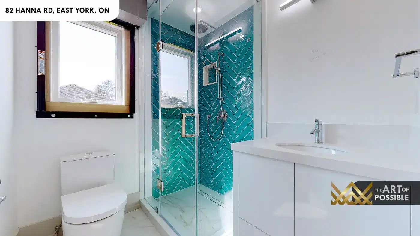 Secondary bathroom with teal herringbone tile walk-in shower at 82 Hanna Rd
