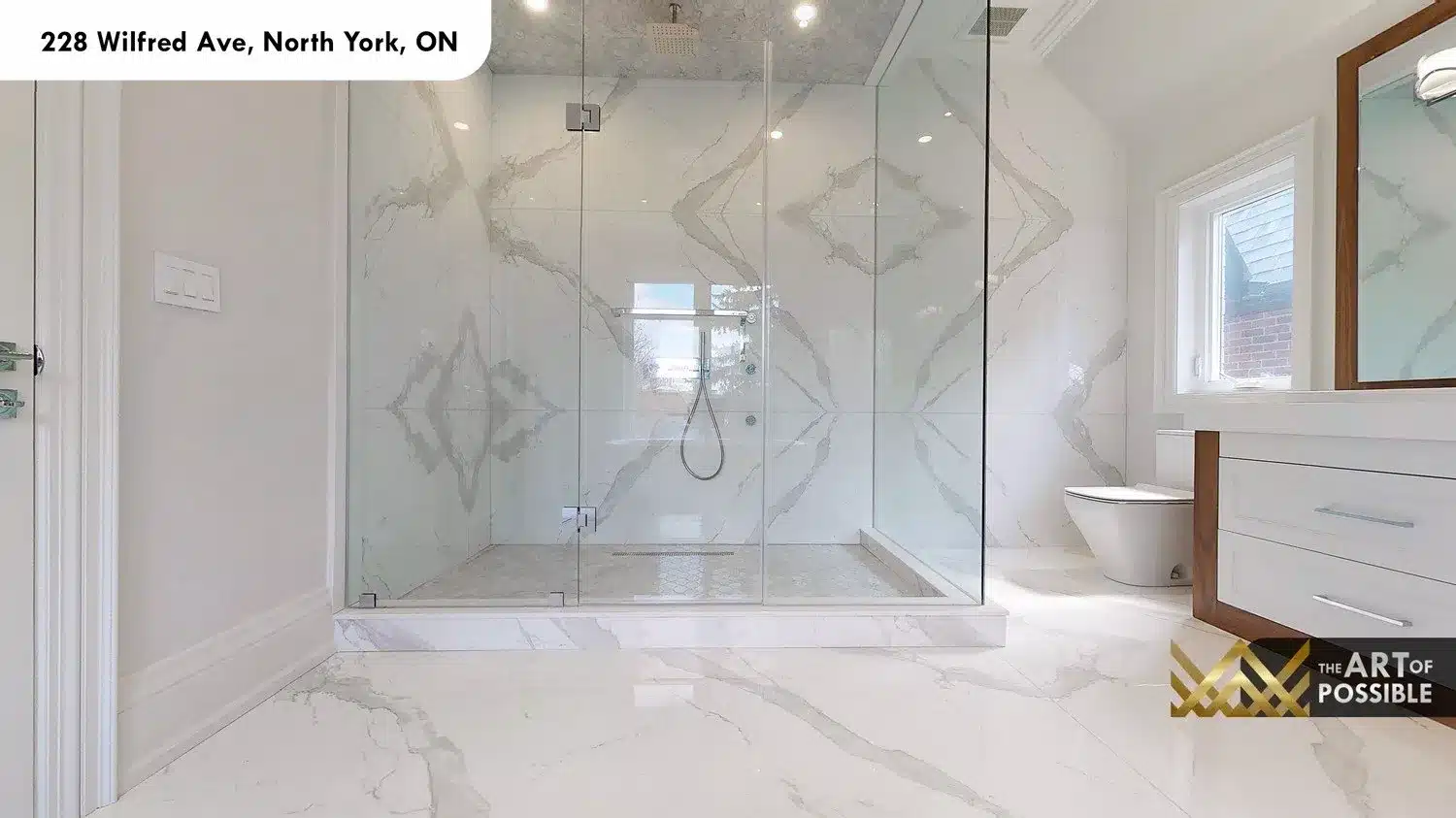 228 Wilfred Ave ensuite shower book-matched marble diamond pattern glass enclosure rain head