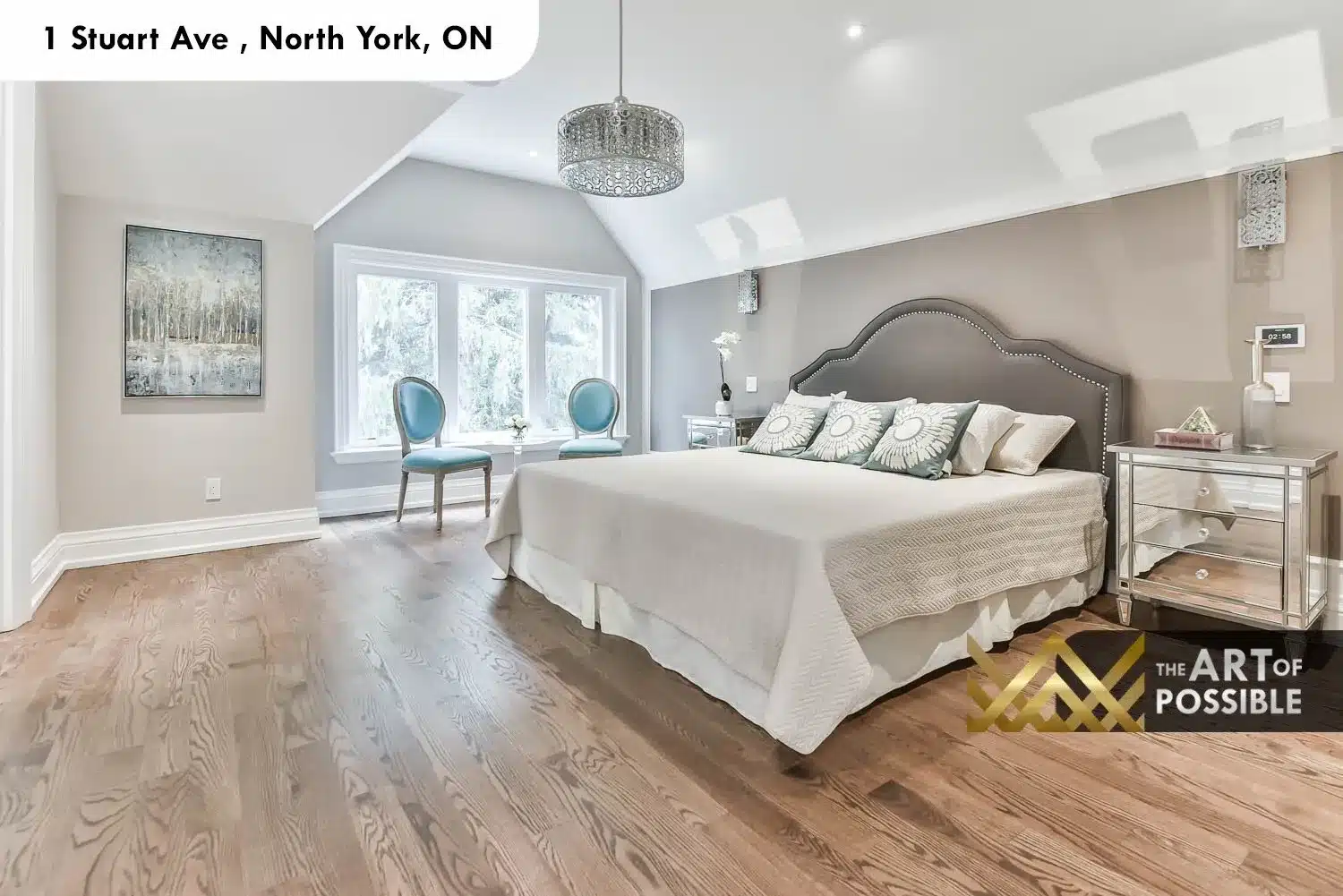 1 Stuart Ave primary bedroom vaulted ceiling skylight crystal chandelier