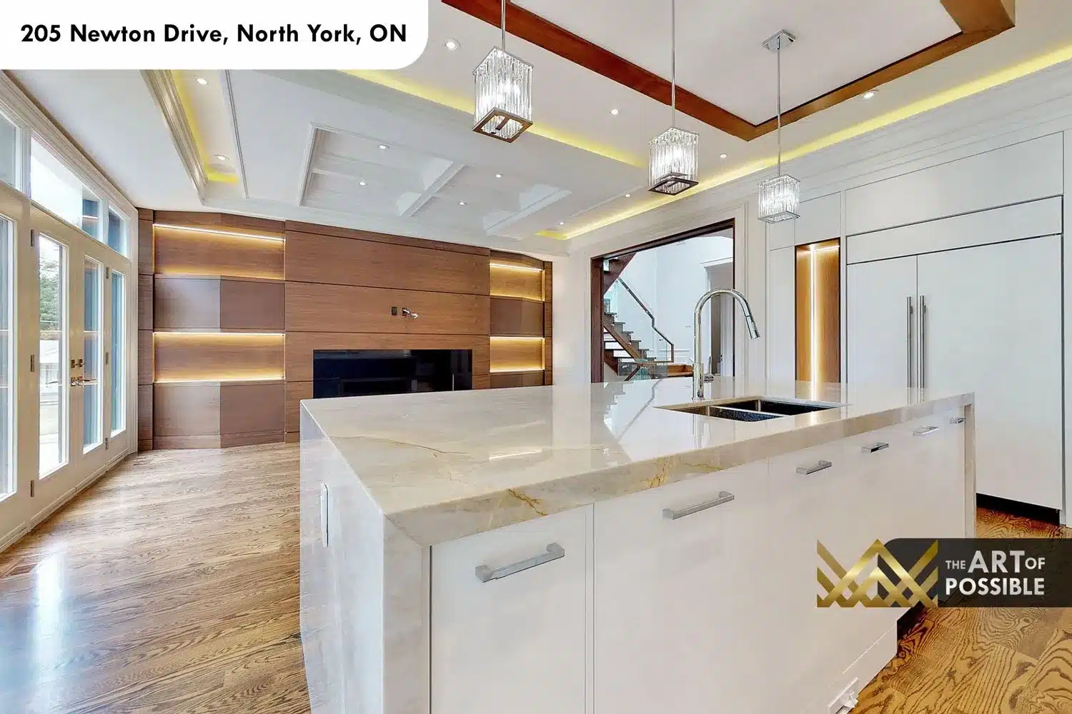 205 Newton Drive kitchen marble waterfall island crystal cube pendants walnut range hood