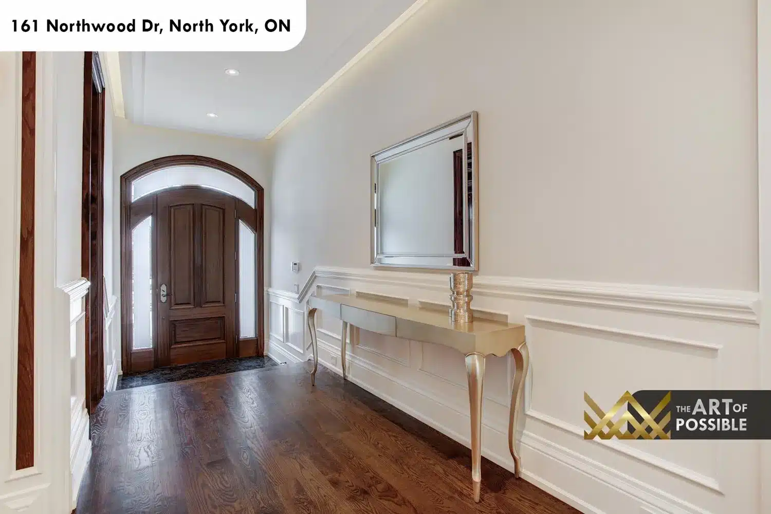 161 Northwood Dr North York foyer arched walnut door white wainscoting cove lighting