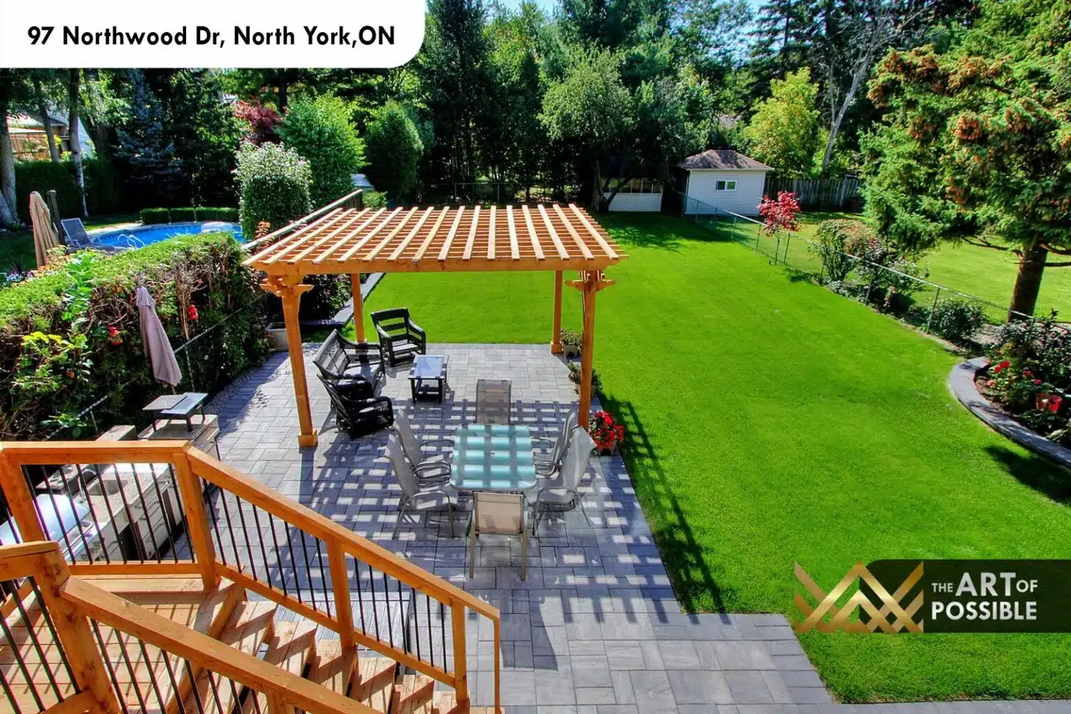 97 Northwood Dr rear yard aerial view pergola patio lawn pool area
