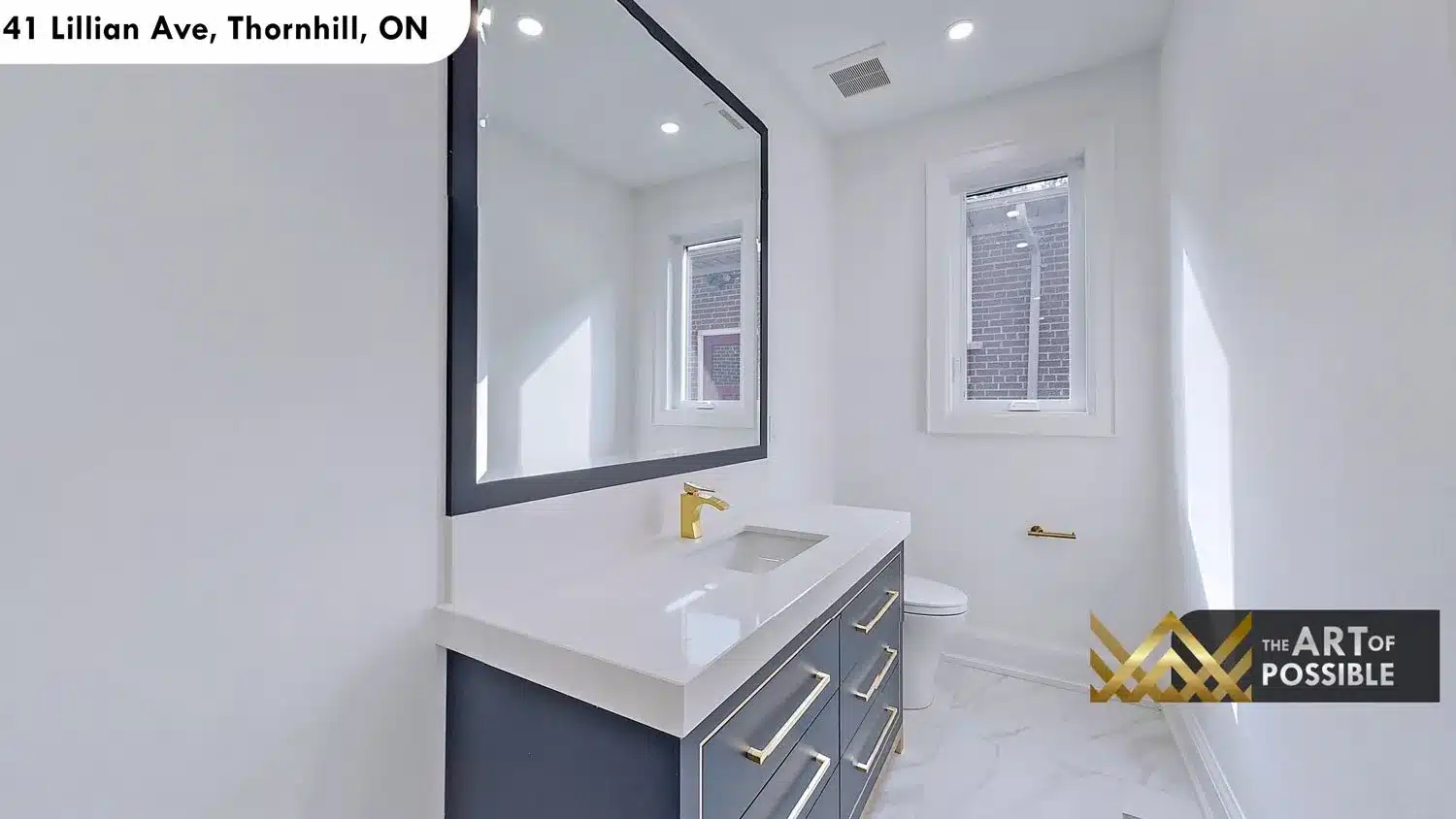 41 Lillian Ave Thornhill powder bathroom navy vanity gold faucet black LED mirror