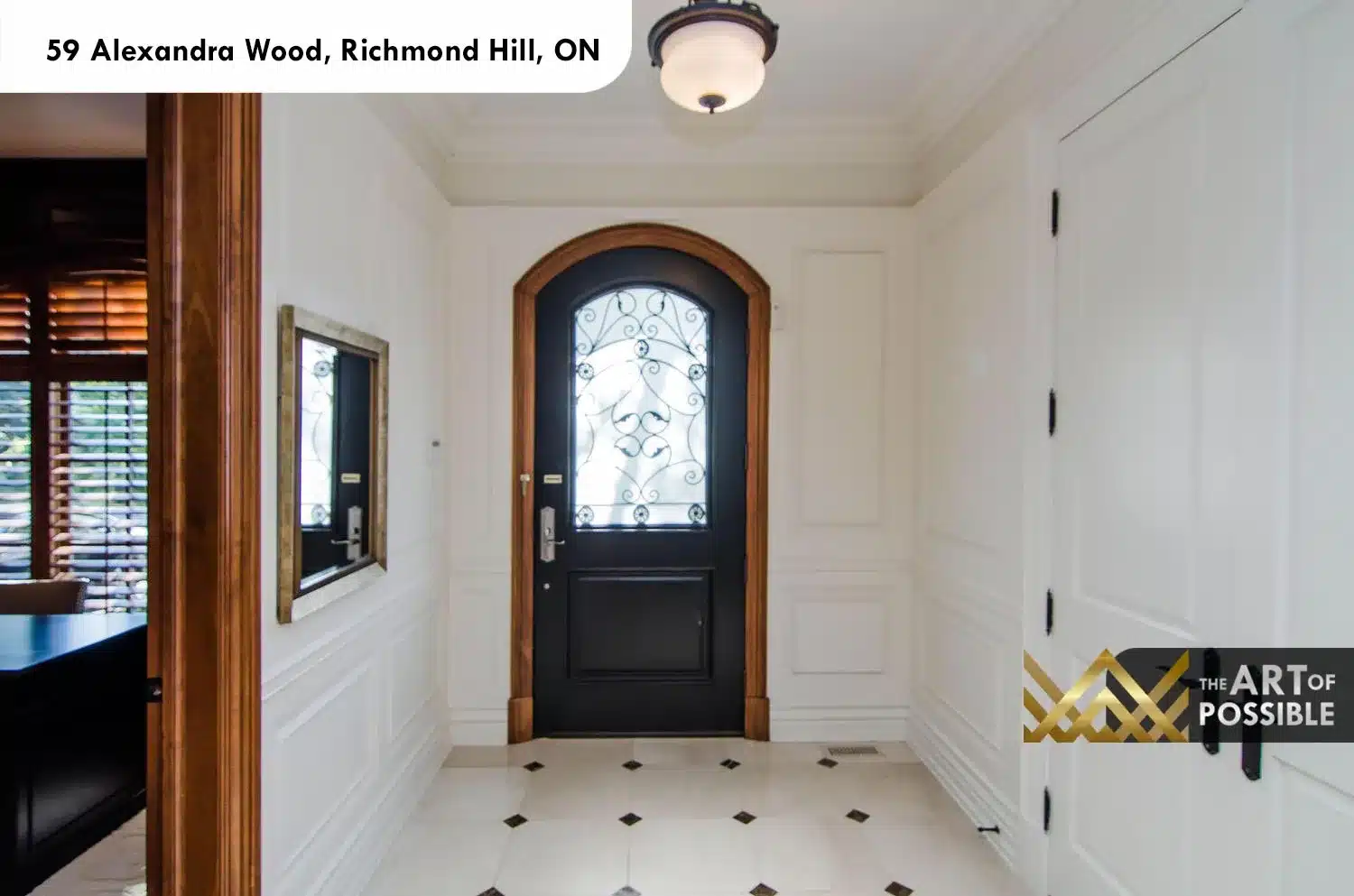 59 Alexandra Wood North York foyer arched iron scrollwork front door marble tile inlay floor