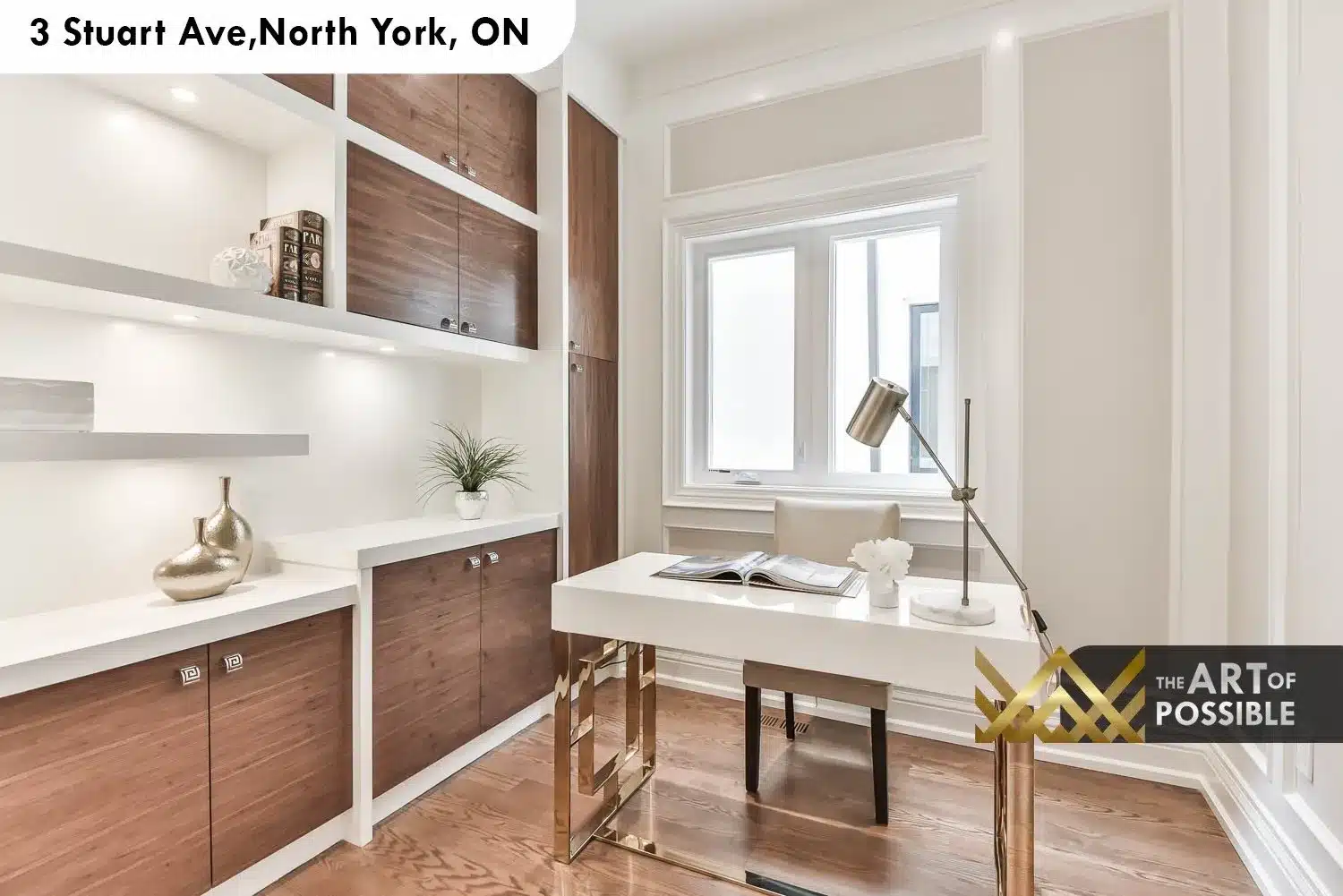 Main floor home office with walnut built-in cabinetry, white shelving and lacquer floating desk