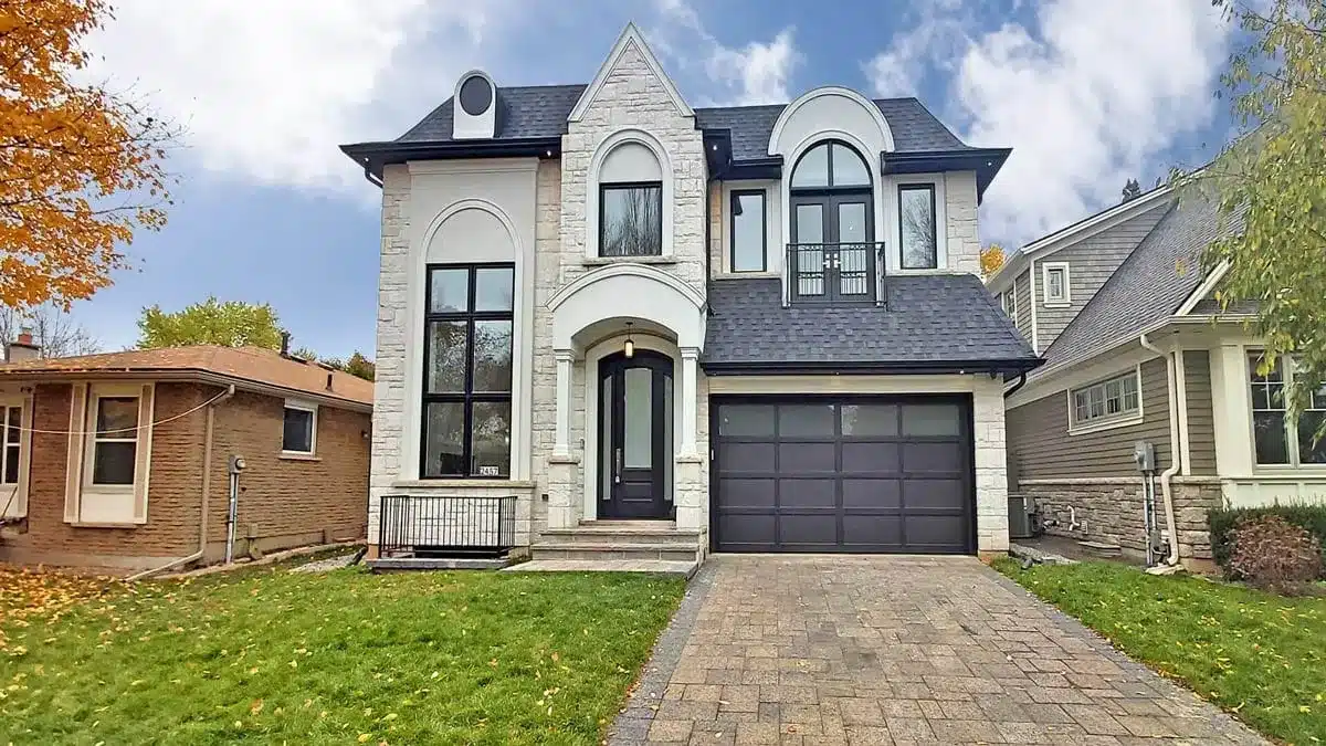 2457 Ventura Dr, Oakville: Limestone Chateau with a Marble Ensuite, Arched Windows and a Walkout Lower Level