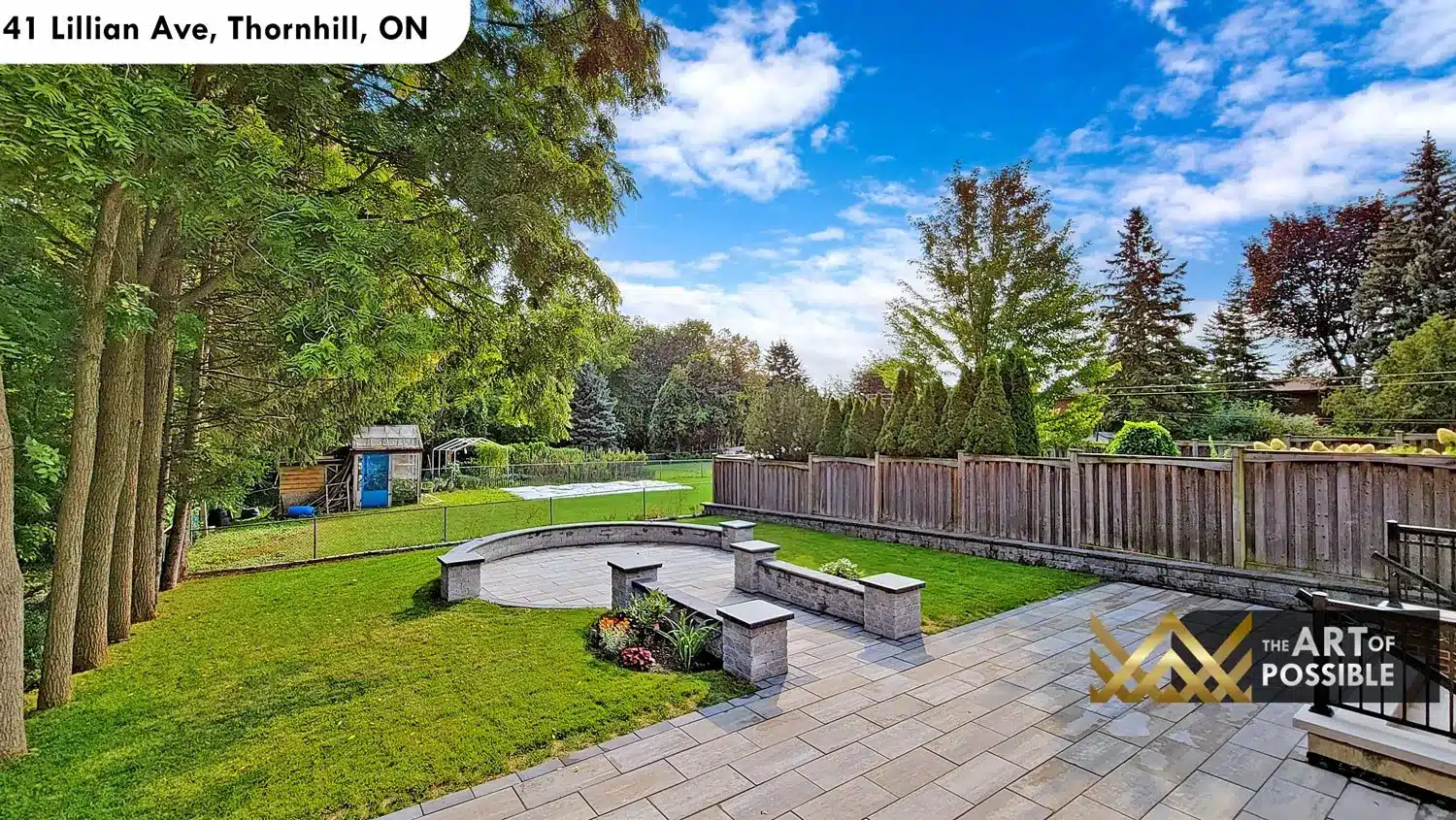 41 Lillian Ave Thornhill backyard interlock stone patio curved stone seating wall deck
