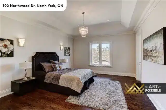 Secondary bedroom with crystal chandelier and tray ceiling, 192 Northwood Dr