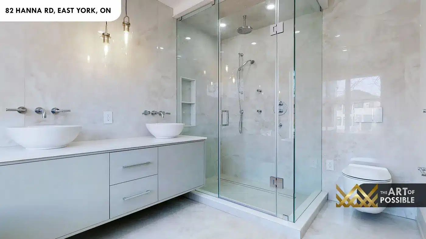 Frameless glass walk-in shower with body jets in primary ensuite at 82 Hanna Rd