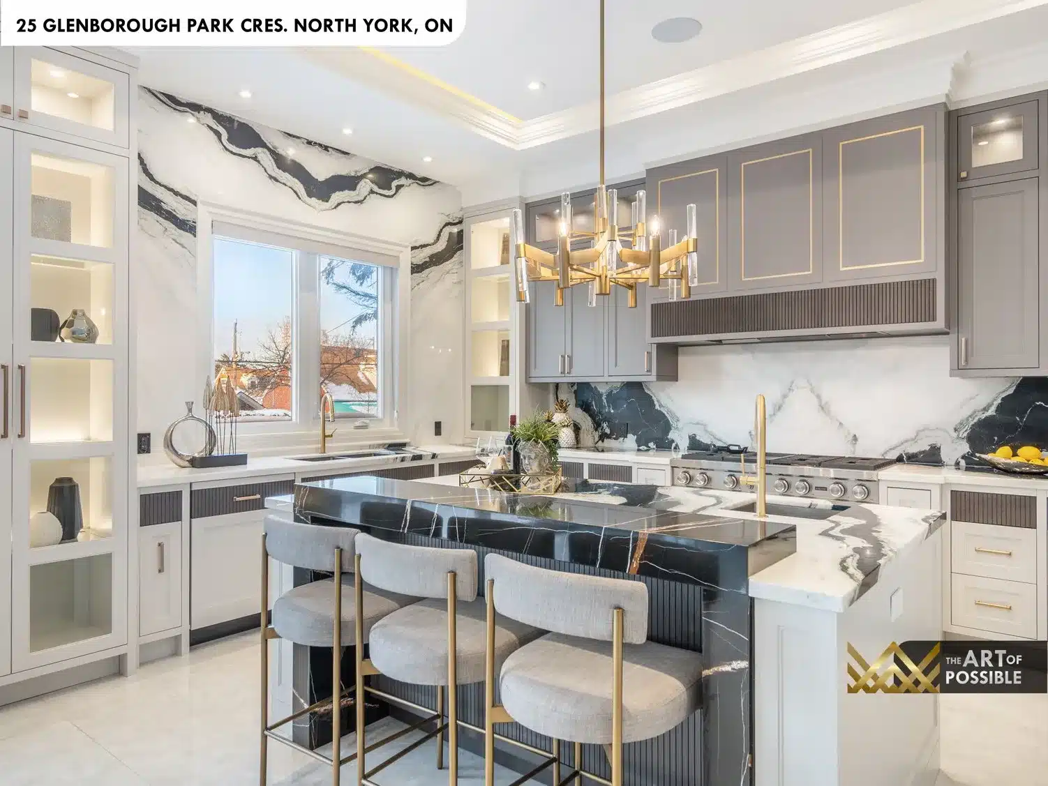 Kitchen full-height stone slab backsplash and custom range hood