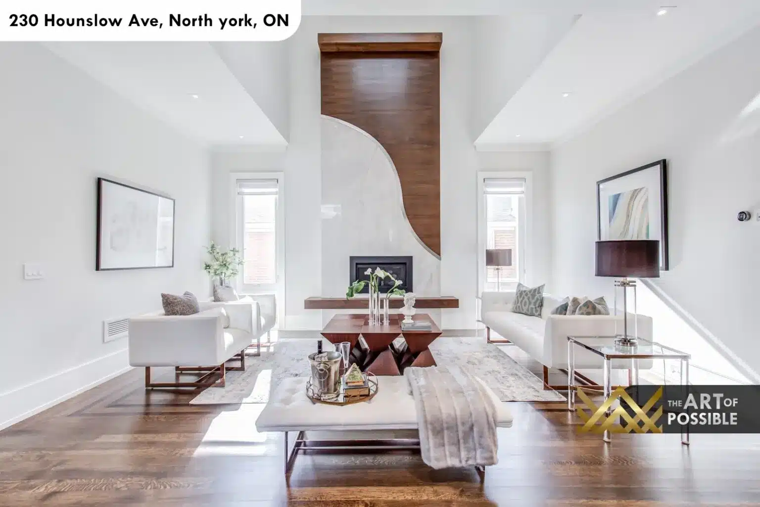 Second angle of the sculptural walnut fireplace wall in the formal living room