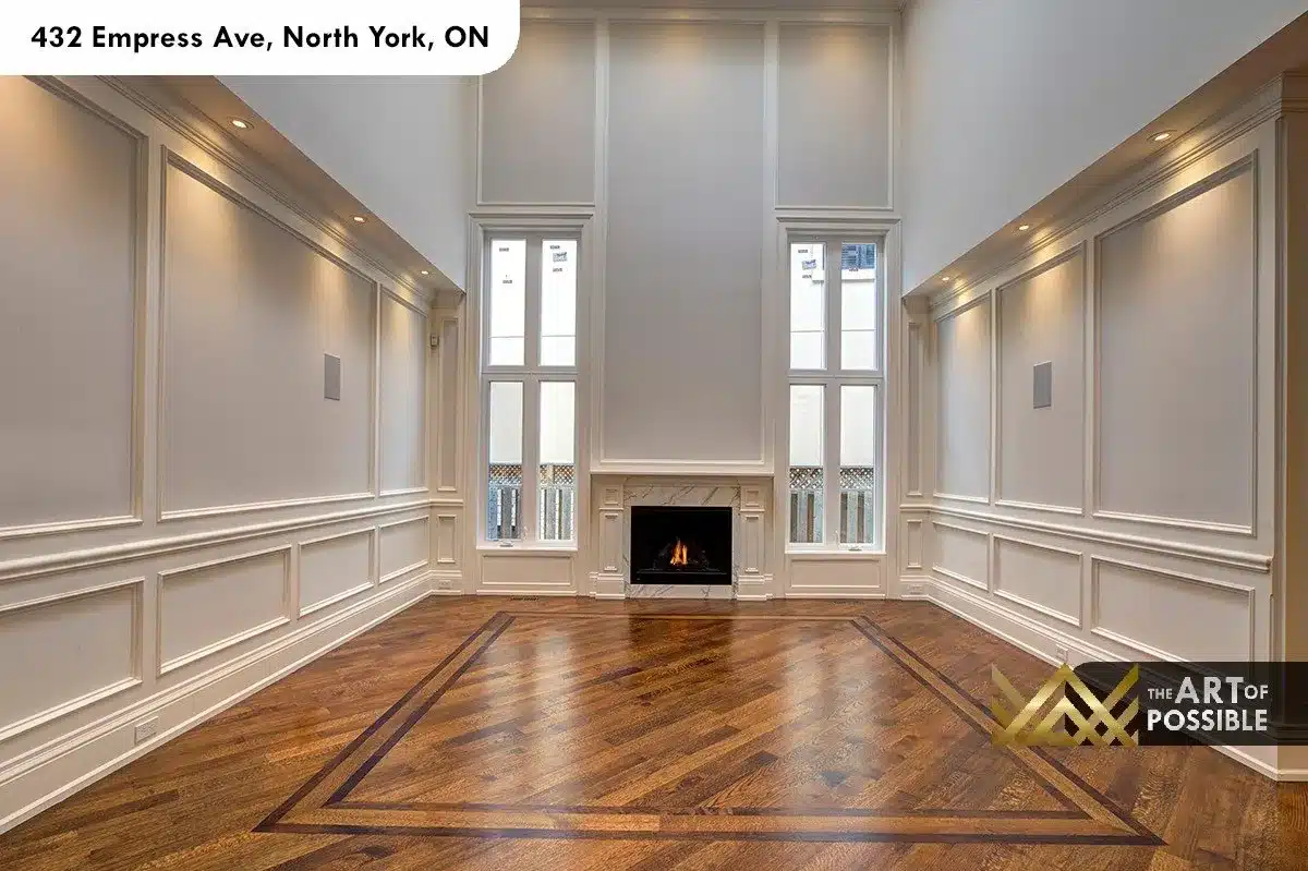 432 Empress Ave - two-storey living room with marble fireplace and floor-to-ceiling wainscoting