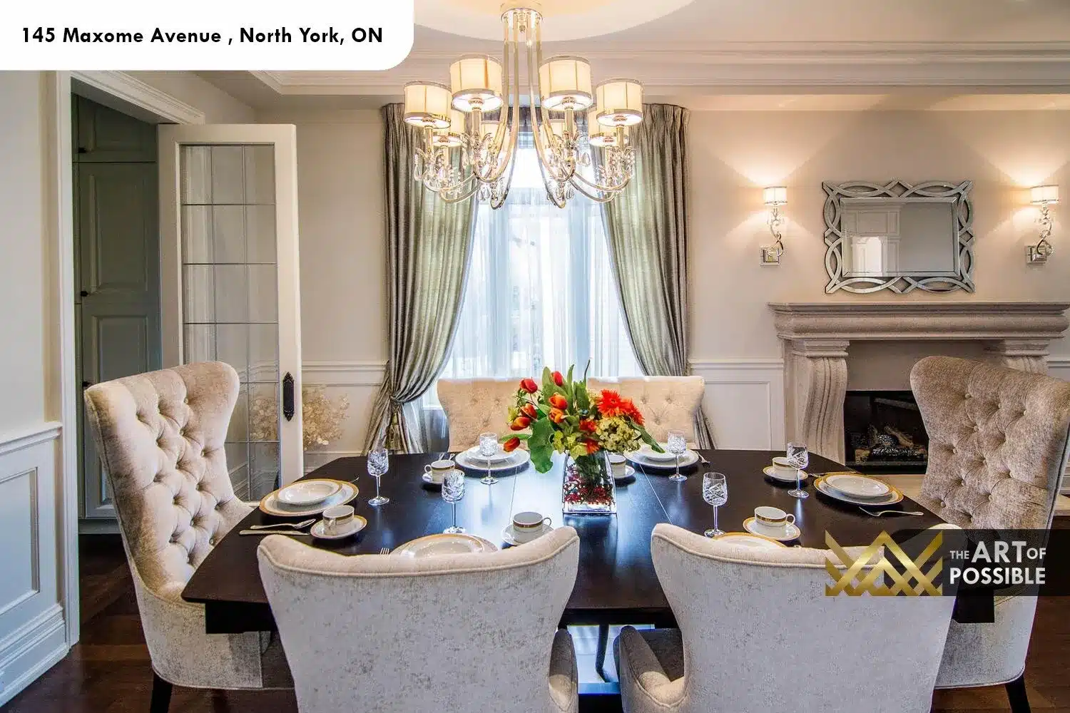 145 Maxome Avenue dining room tufted velvet chairs crystal chandelier limestone fireplace Venetian mirror