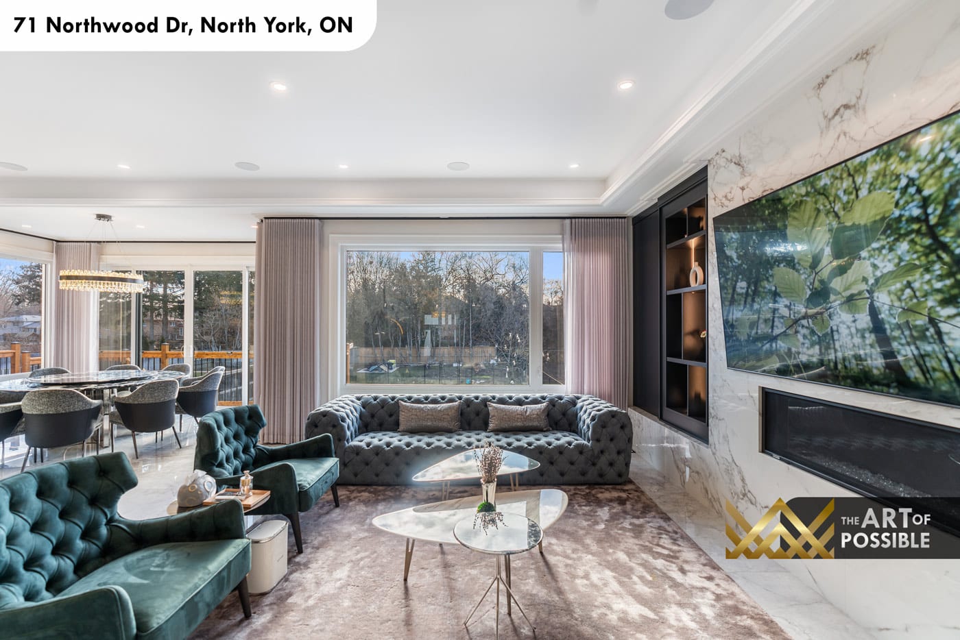 Family room rear view showing marble fireplace wall and sliding doors to yard