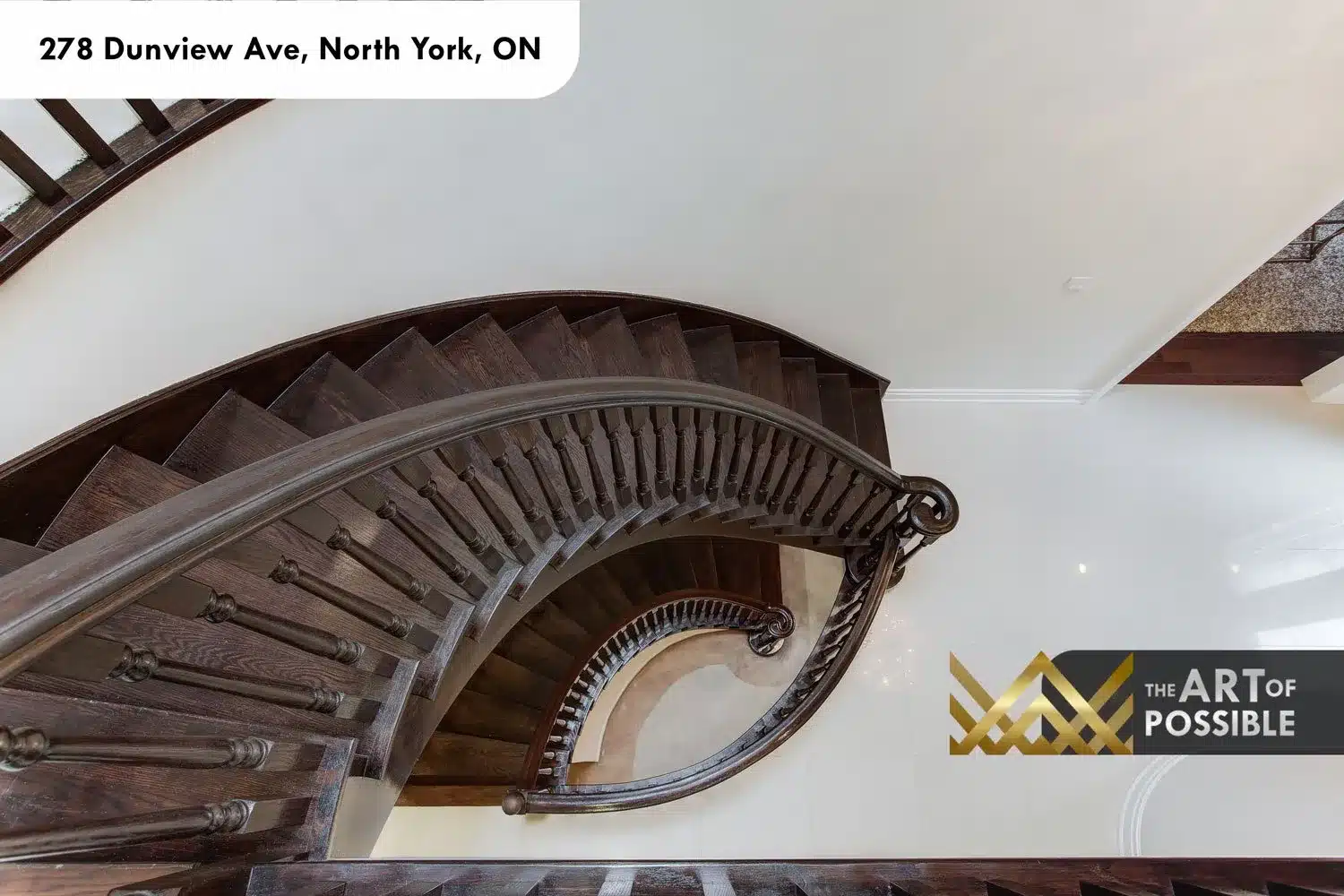 Aerial view of the curved staircase spiral, turned balusters and continuous handrail