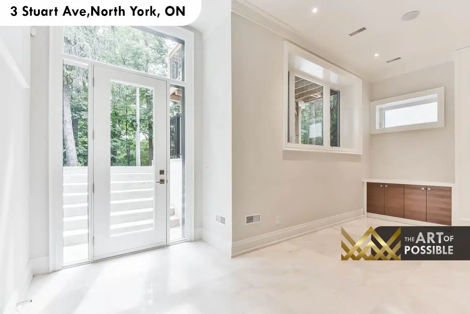 Lower level walkout with full-glass double door to rear yard and polished porcelain tile floors