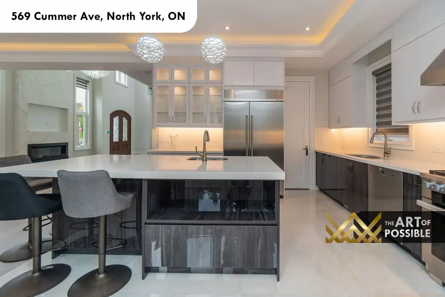 569 Cummer Ave kitchen glass front upper cabinets integrated refrigerator quartz island under cabinet lighting