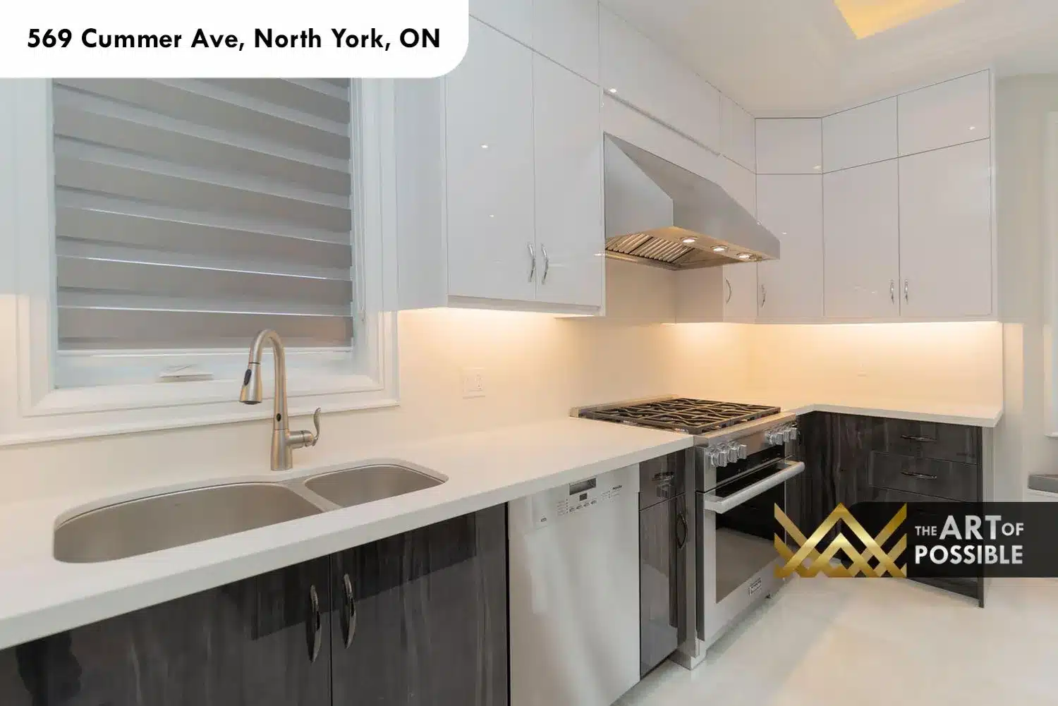 569 Cummer Ave kitchen stainless gas range double oven range hood dark lower cabinets quartz countertop