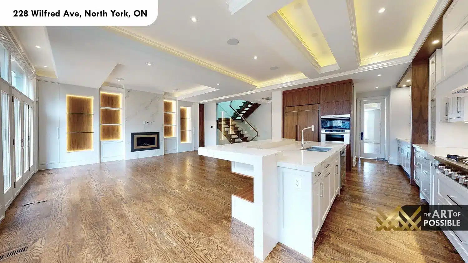 228 Wilfred Ave open-concept kitchen family room backlit niches staircase