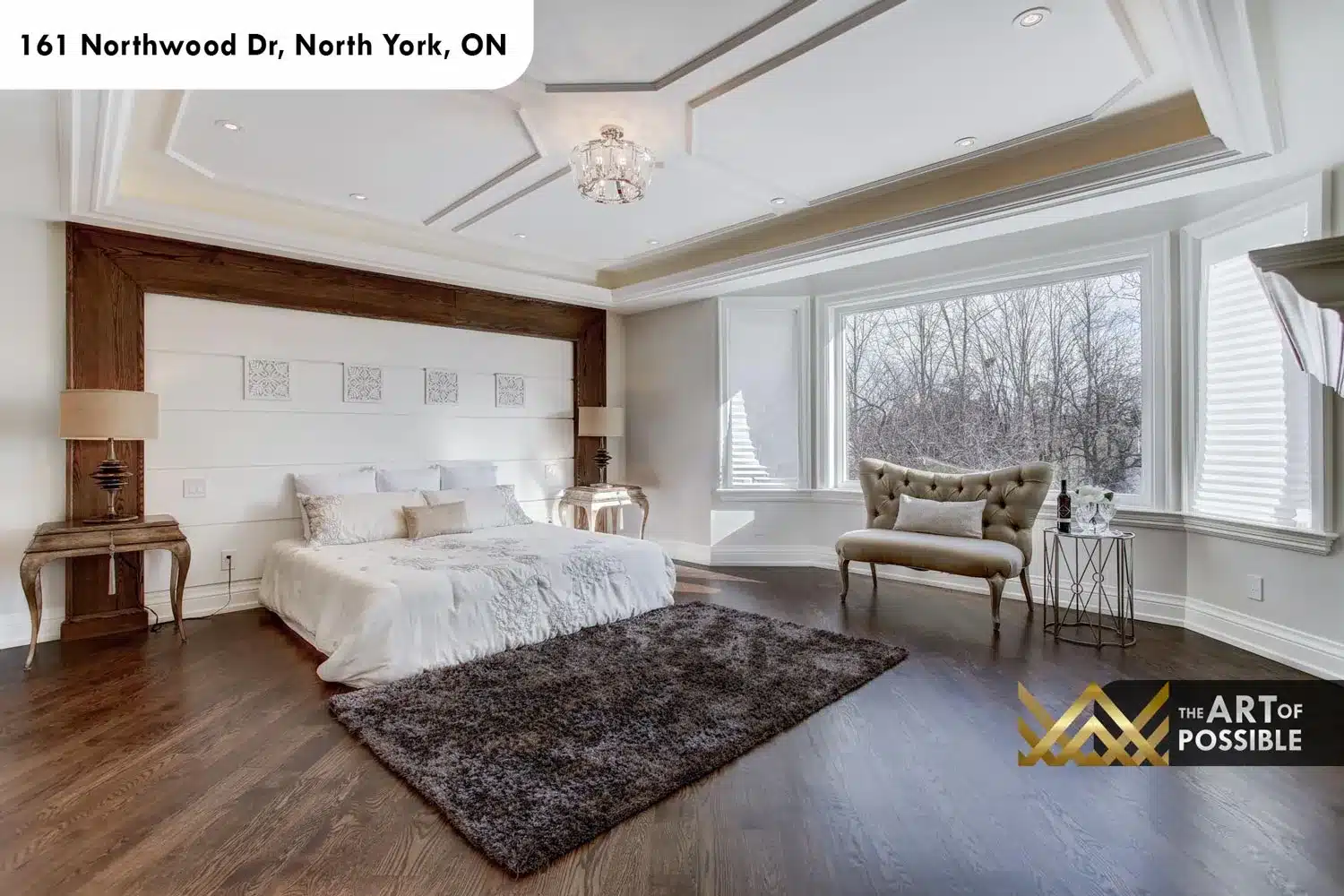 161 Northwood Dr North York primary bedroom tray ceiling crystal chandelier striped wallpaper walnut headboard frame