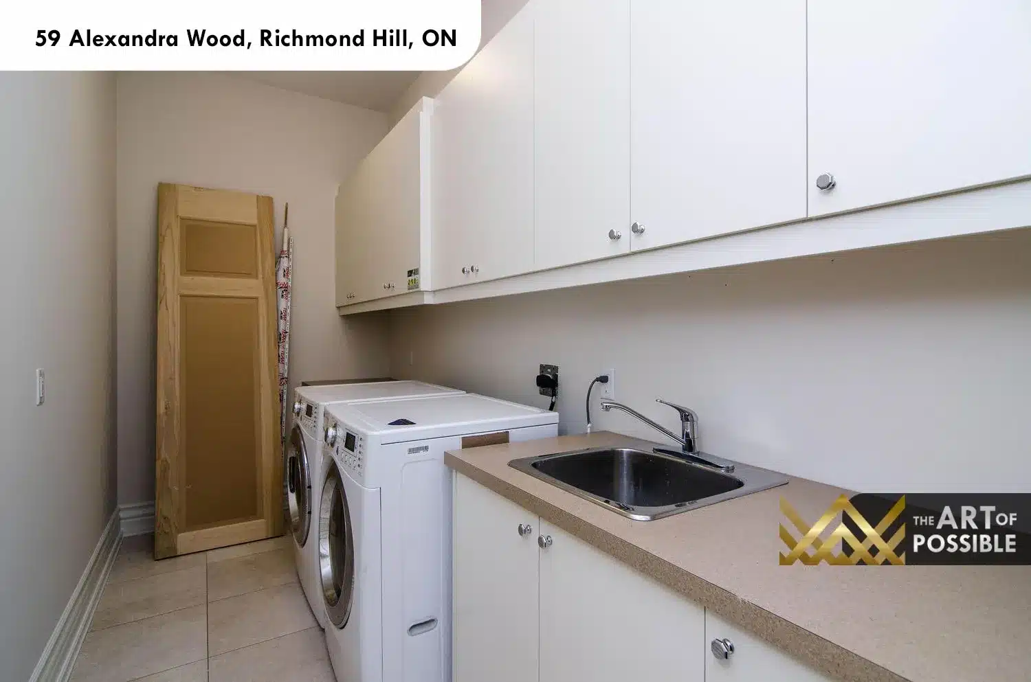 59 Alexandra Wood North York upper laundry room white cabinetry washer dryer utility sink