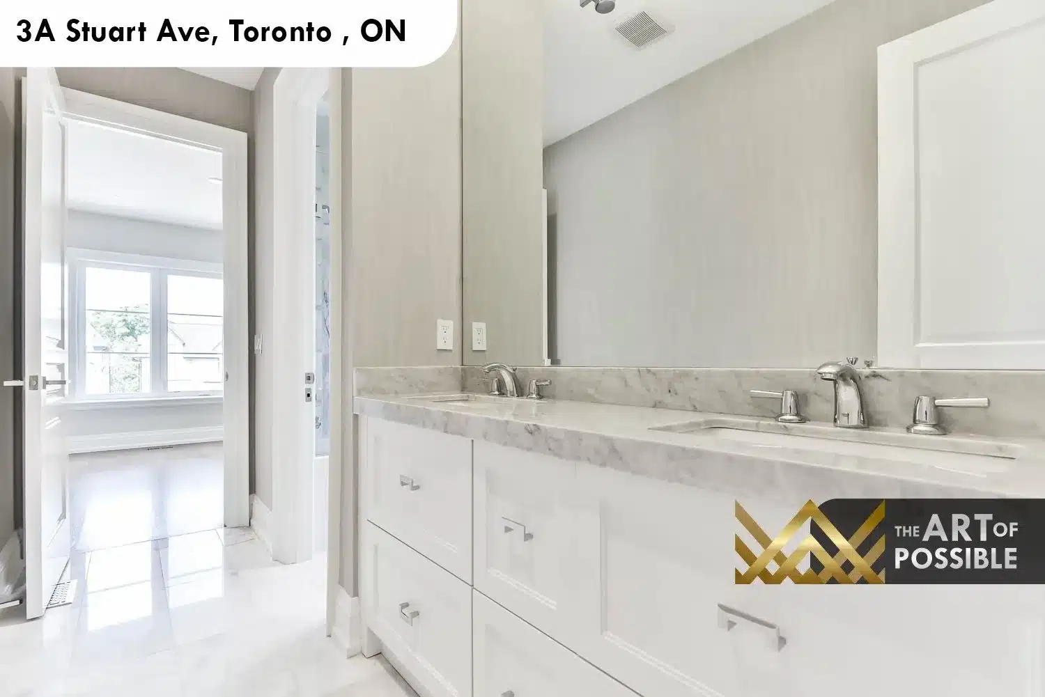 Secondary ensuite at 3A Stuart Ave with white double vanity, marble countertop and chrome fixtures