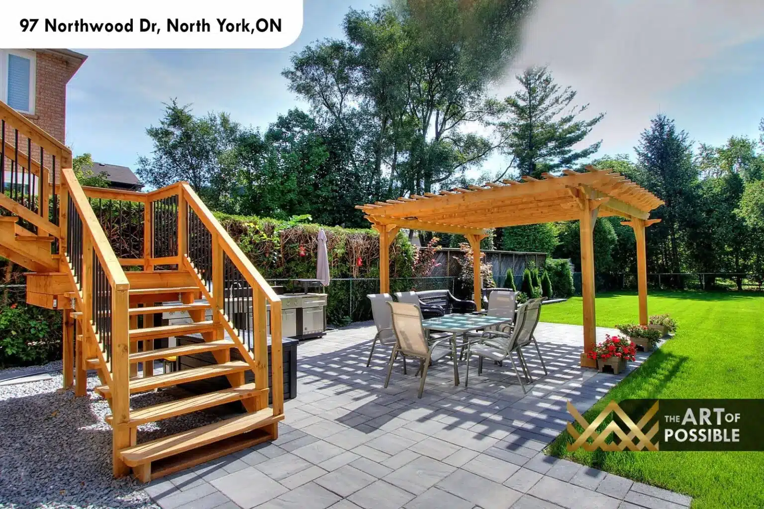 97 Northwood Dr backyard cedar pergola stone paver patio outdoor dining rear deck